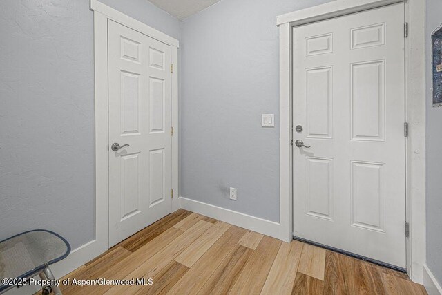 955 Sequoia Ave, Craig, CO 81625 - entrance foyer with light wood-style floors and baseboards
