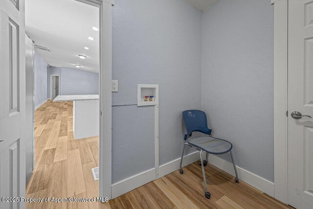955 Sequoia Ave, Craig, CO 81625 - washroom with washer hookup and light wood-style flooring
