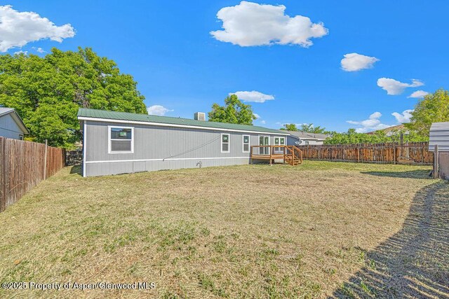 955 Sequoia Ave, Craig, CO 81625 - rear view of house featuring a deck and a fenced backyard