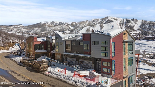 1855 Burgess Creek Rd Unit 6, Steamboat, CO 80487 - view of front of house featuring a mountain view and stone siding