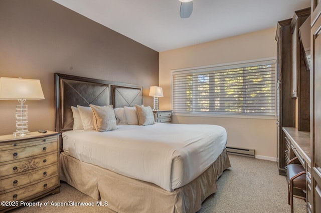 150 Snowmass Club Cir Unit 1623, Snowmass Village, CO 81615 - bedroom featuring light colored carpet, baseboard heating, baseboards, and a ceiling fan