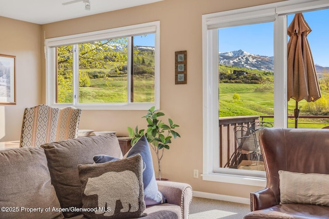 150 Snowmass Club Cir Unit 1623, Snowmass Village, CO 81615 - sitting room featuring carpet, a mountain view, and baseboards