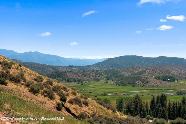 mountain view featuring a rural view