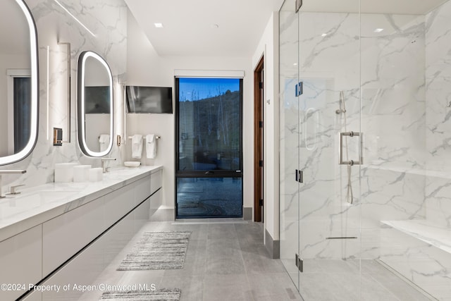 bathroom featuring vanity and walk in shower