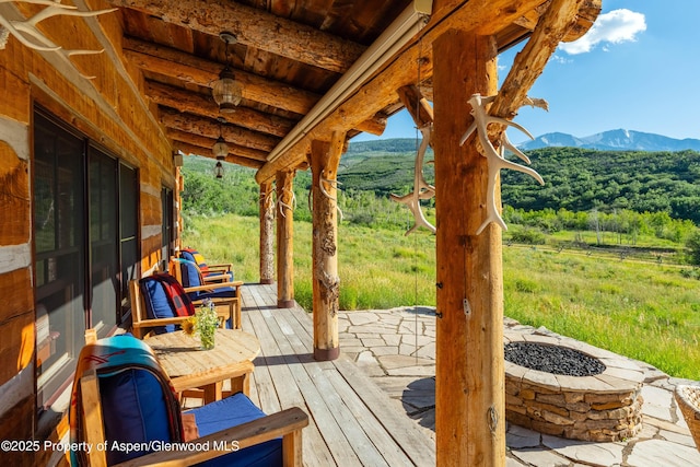 1350 Old Herron Rd, Basalt, CO 81621 - wooden deck featuring a mountain view and an outdoor fire pit