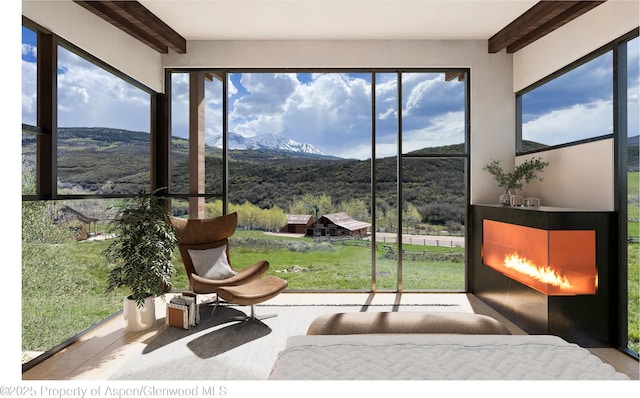 1350 Old Herron Rd, Basalt, CO 81621 - bedroom with a mountain view, beamed ceiling, and wood finished floors