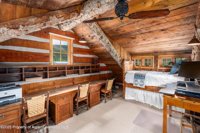 1350 Old Herron Rd, Basalt, CO 81621 - bedroom with vaulted ceiling, wooden walls, built in study area, wooden ceiling, and light colored carpet