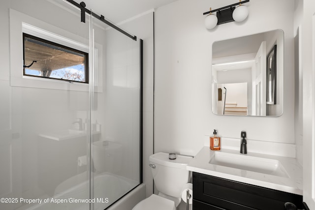 1625 Cooper Ave, Glenwood Springs, CO 81601 - full bath featuring combined bath / shower with glass door, vanity, and toilet