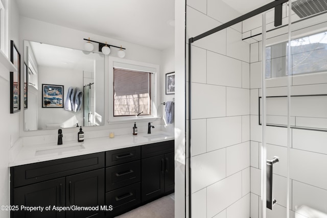 1625 Cooper Ave, Glenwood Springs, CO 81601 - full bathroom with a shower stall, double vanity, and a sink
