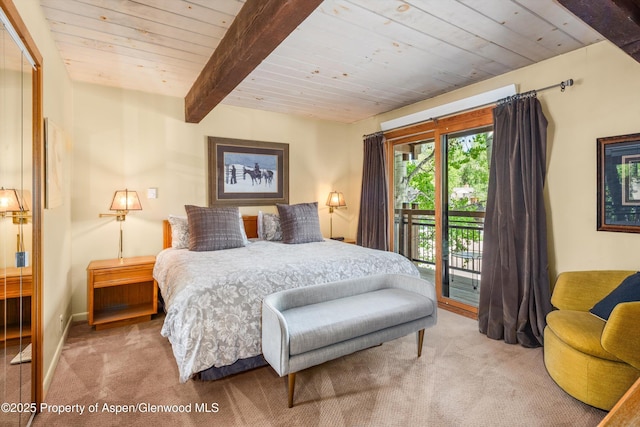 131 E Durant Ave Unit 202, Aspen, CO 81611 - bedroom with carpet flooring, wood ceiling with exposed beams, and access to exterior