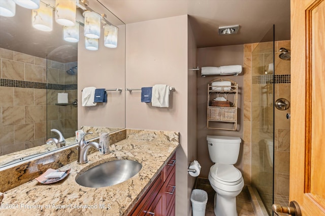 131 E Durant Ave Unit 202, Aspen, CO 81611 - full bath with vanity, a tile shower, and toilet