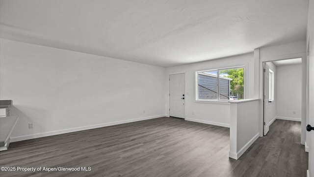 2430 W Ave, Rifle, CO 81650 - entryway with dark wood-type flooring and baseboards