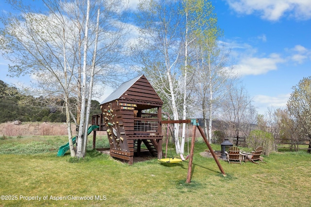 exterior space with fence and a yard