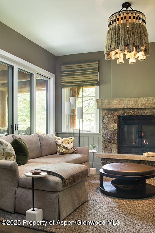 87 Thunderbowl Ln, Aspen, CO 81611 - living room with a stone fireplace