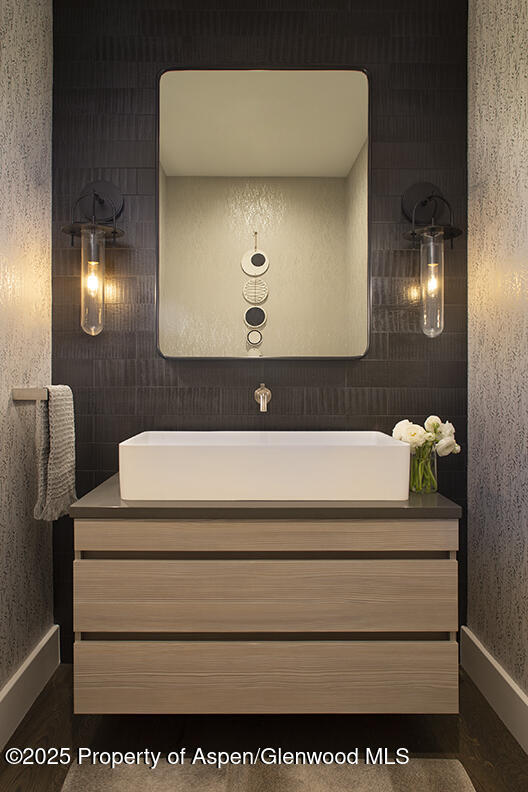 87 Thunderbowl Ln, Aspen, CO 81611 - bathroom with vanity and baseboards