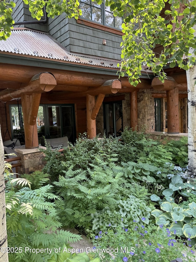 87 Thunderbowl Ln, Aspen, CO 81611 - back of property featuring a metal roof