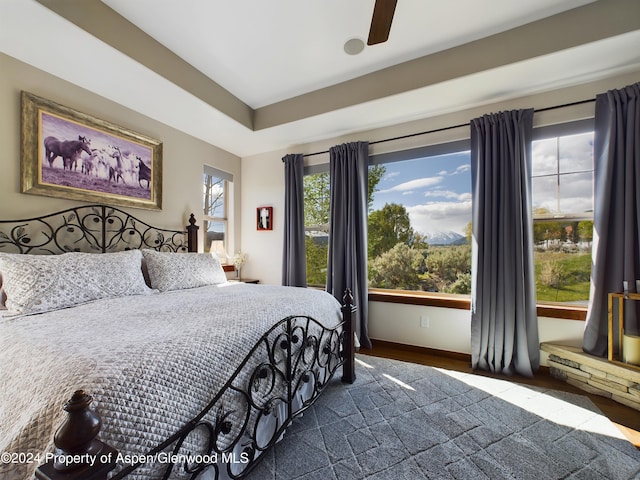 bedroom featuring dark wood-style flooring