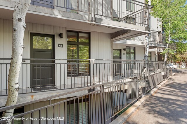 800 E Hopkins Ave Unit A-3, Aspen, CO 81611 - view of exterior entry featuring a balcony