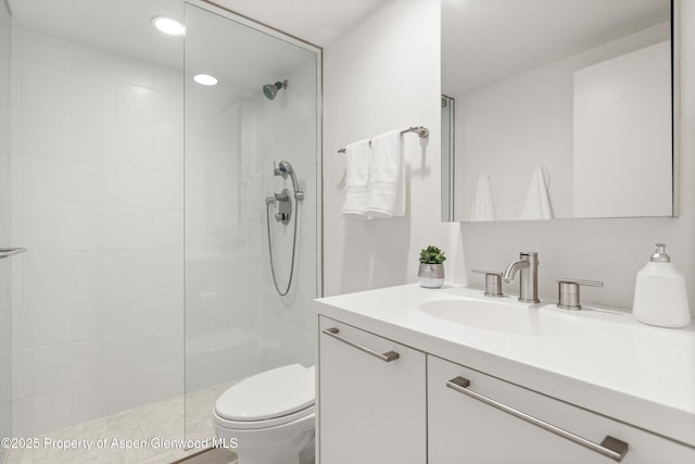 800 E Hopkins Ave Unit A-3, Aspen, CO 81611 - bathroom with vanity, toilet, walk in shower, and recessed lighting