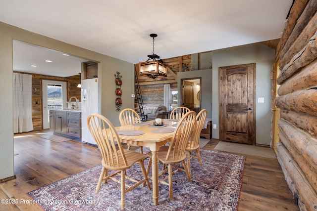 dining area featuring wood finished floors