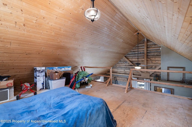 unfurnished bedroom featuring vaulted ceiling and wooden ceiling