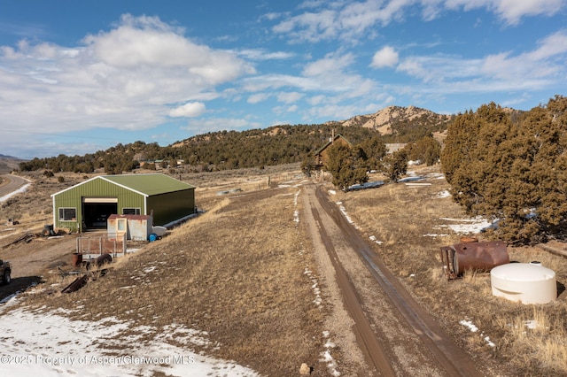 exterior space featuring a mountain view