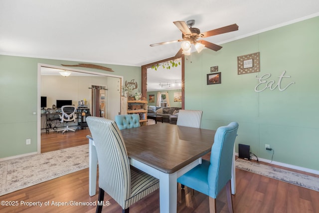 1137 Rose St, Craig, CO 81625 - dining room featuring wood finished floors, a desk, crown molding, and a ceiling fan
