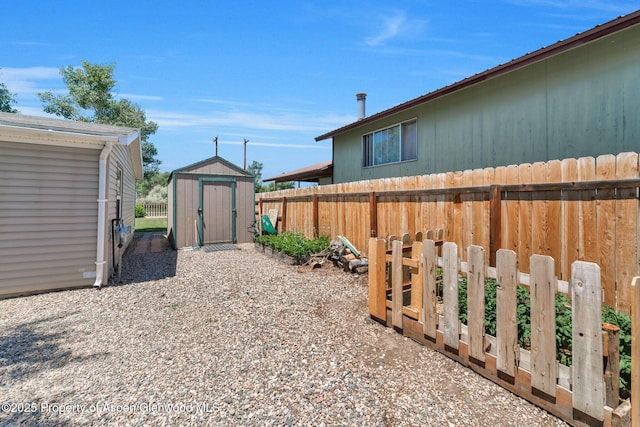 1137 Rose St, Craig, CO 81625 - fenced backyard with a storage shed