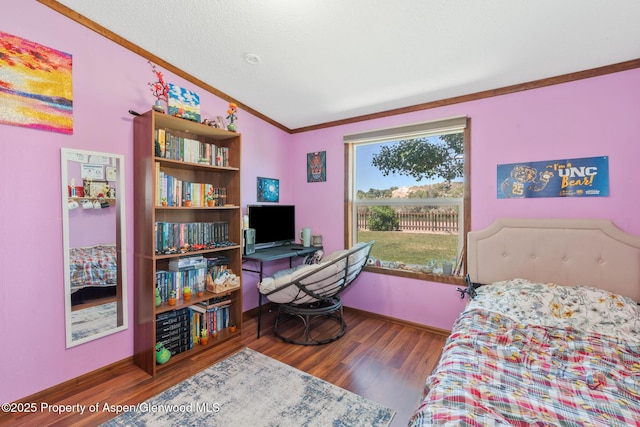 1137 Rose St, Craig, CO 81625 - bedroom with crown molding, wood finished floors, and vaulted ceiling