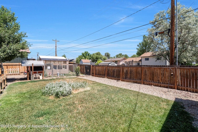 1137 Rose St, Craig, CO 81625 - fenced backyard featuring an outdoor structure and exterior structure
