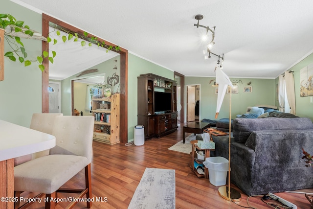 1137 Rose St, Craig, CO 81625 - living area featuring crown molding and wood finished floors