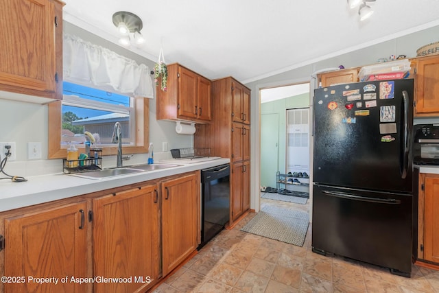 1137 Rose St, Craig, CO 81625 - kitchen featuring black appliances, crown molding, brown cabinetry, light countertops, and stone finish flooring