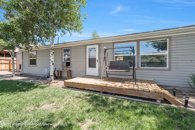 1137 Rose St, Craig, CO 81625 - back of property featuring a yard and a deck