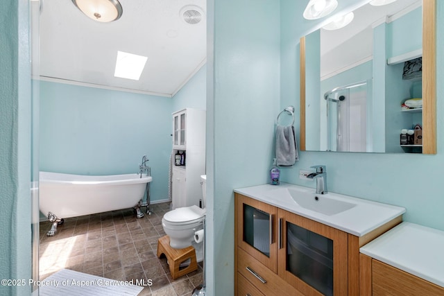 1137 Rose St, Craig, CO 81625 - bathroom with a skylight, vaulted ceiling, vanity, a freestanding bath, and a shower