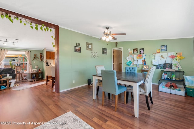1137 Rose St, Craig, CO 81625 - dining area with crown molding, a ceiling fan, and wood finished floors