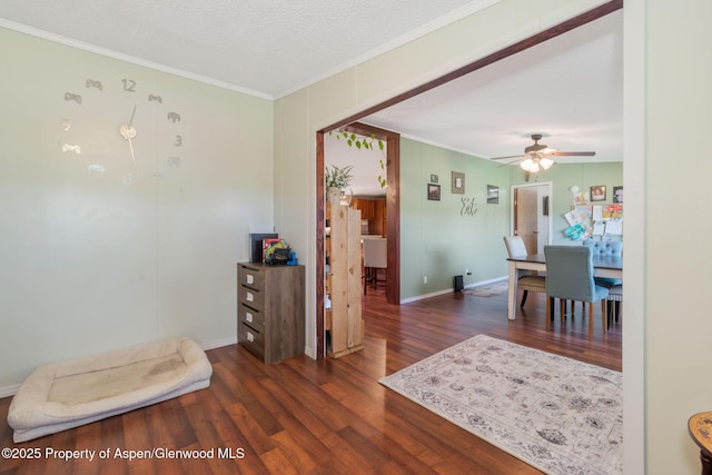 1137 Rose St, Craig, CO 81625 - dining space with crown molding, wood finished floors, and ceiling fan