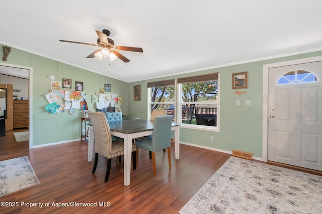 1137 Rose St, Craig, CO 81625 - dining room featuring dark wood-style flooring, ceiling fan, crown molding, and vaulted ceiling