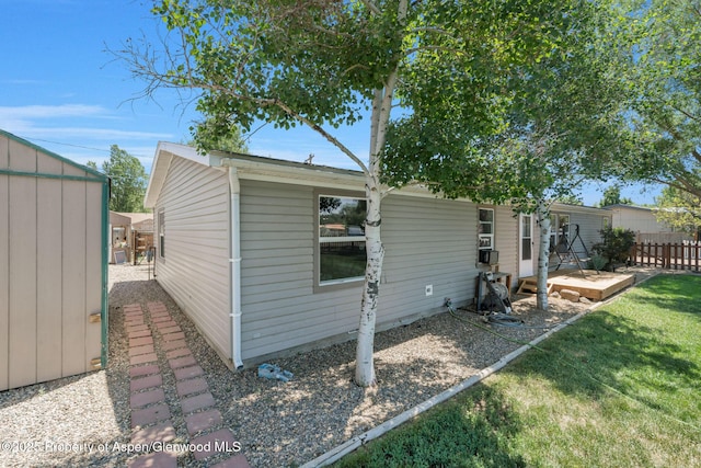 1137 Rose St, Craig, CO 81625 - back of house featuring a storage shed