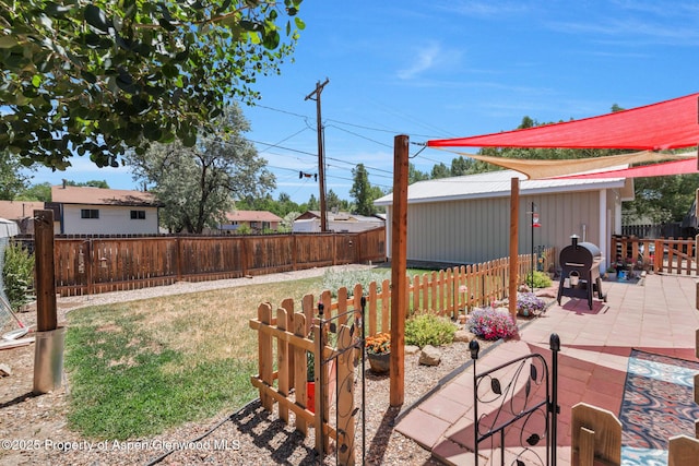 1137 Rose St, Craig, CO 81625 - fenced backyard with a patio