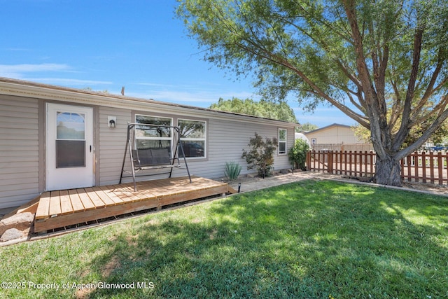 1137 Rose St, Craig, CO 81625 - view of yard featuring a deck