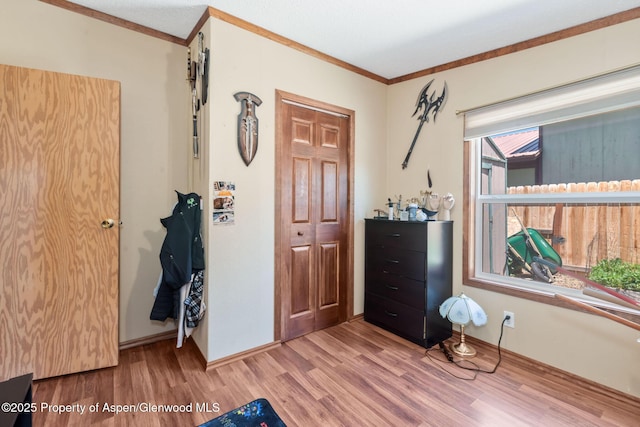 1137 Rose St, Craig, CO 81625 - bedroom featuring wood finished floors and crown molding
