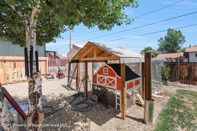 1137 Rose St, Craig, CO 81625 - view of poultry coop featuring a fenced backyard