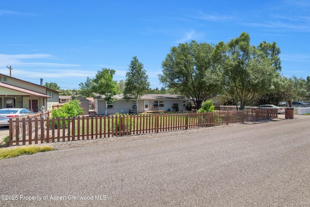1137 Rose St, Craig, CO 81625 - single story home with a fenced front yard and a residential view