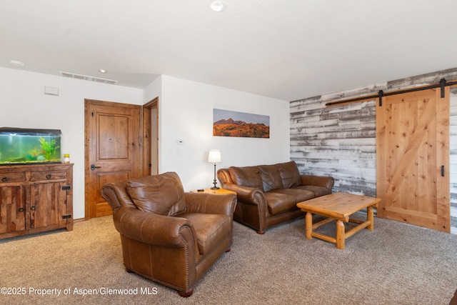 1468 W Main St, Carbondale, CO 81623 - living area featuring carpet, a barn door, and an accent wall