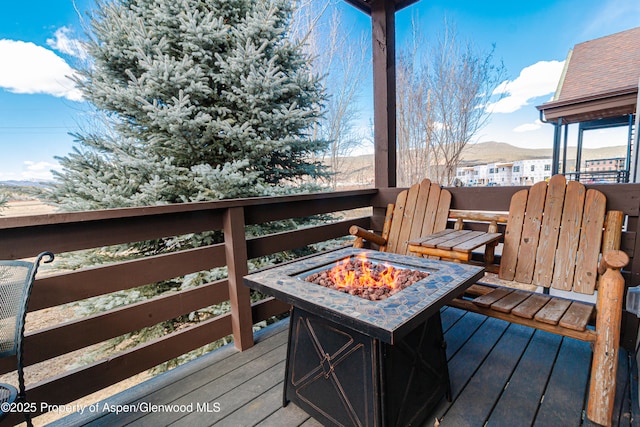 1468 W Main St, Carbondale, CO 81623 - wooden terrace featuring an outdoor fire pit and a mountain view