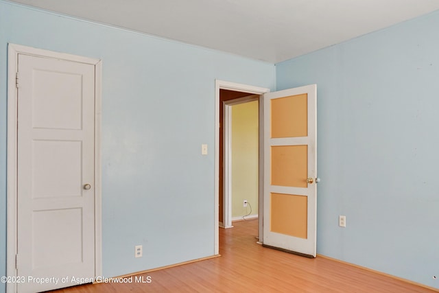 empty room featuring hardwood / wood-style floors