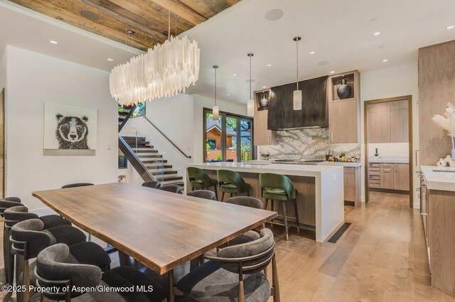 700 W Smuggler St, Aspen, CO 81611 - wine area featuring wood finished floors and baseboards