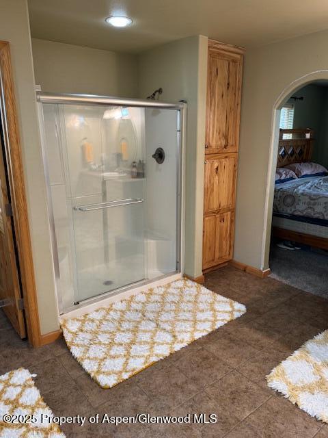 3695 W W 6th St, Craig, CO 81625 - ensuite bathroom with a shower stall and tile patterned floors