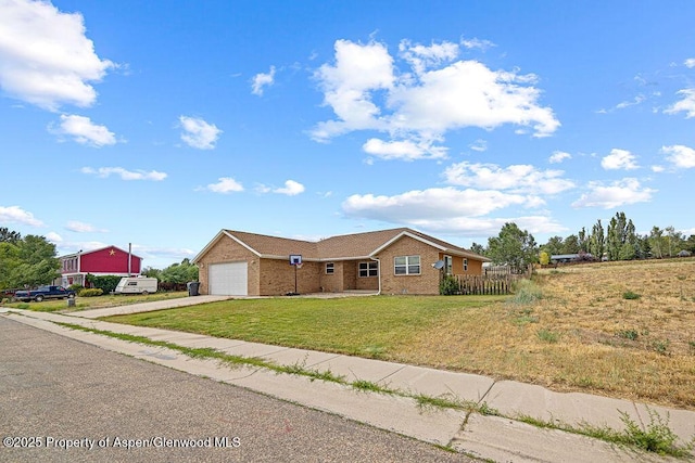 3695 W W 6th St, Craig, CO 81625 - ranch-style home featuring concrete driveway and brick siding