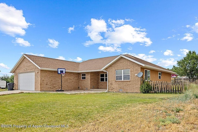 3695 W W 6th St, Craig, CO 81625 - view of front of home featuring brick siding, a garage, concrete driveway, and crawl space